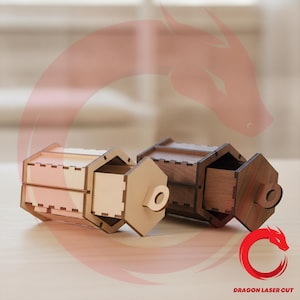 May include: Two hexagonal wooden boxes with sliding drawers and circular pull tabs. One box is light beige, and the other is dark brown. The text DRAGON LASER CUT is visible in the bottom right corner, accompanied by a red dragon logo.