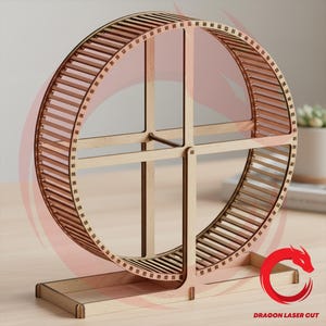 May include: A white ceramic mug with a black handle and the text "But First, Coffee" in a bold, black font. The mug is set against a blurred background, suggesting a cozy setting.