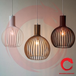 May include: Three modern pendant lights with a cage-like design. The lampshades are in white, brown, and dark brown, each with a visible lightbulb inside. The lights hang from white cords against a neutral background.