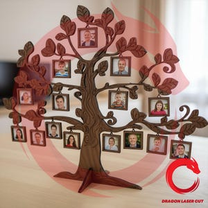 May include: A dark brown wooden tree-shaped photo display stand featuring twelve small square frames hanging from its branches. Each frame holds a portrait photograph. The base is wide and stable, and the text DRAGON LASER CUT is visible.
