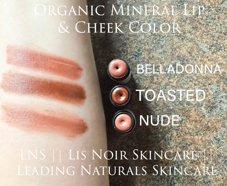 Showing ‘LNS’ ‘Lis Noir Skincare’ ‘Leading Naturals Skincare’ Brown Lipstick Shades swiped on skin from top to bottom, listed as ‘Belladonna’, ‘Toasted’, ‘Nude’.