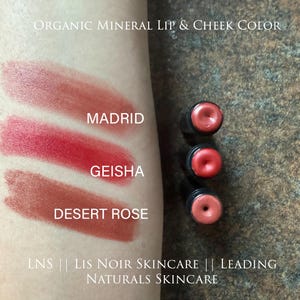 Showing ‘LNS’ ‘Lis Noir Skincare’ ‘Leading Naturals Skincare’ Red Lipstick Shades swiped on skin from top to bottom, listed as ‘Madrid’, ‘Geisha’, ‘Desert Rose’.