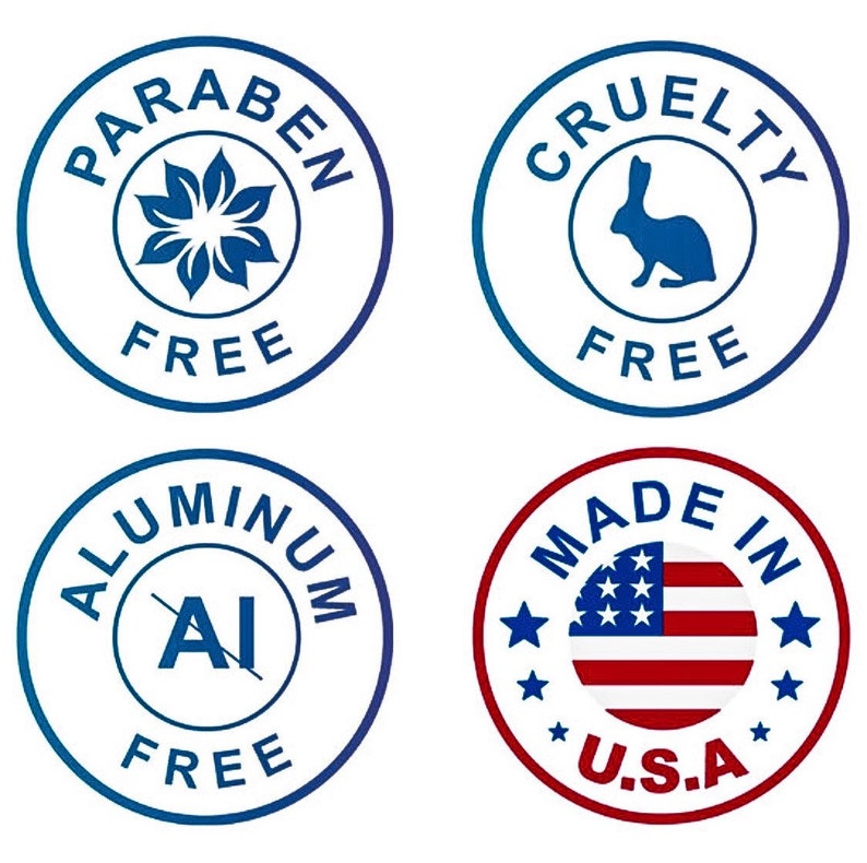 Puede incluir: Cuatro etiquetas circulares azules y rojas con texto blanco. Las etiquetas dicen "Paraben Free", "Cruelty Free", "Aluminum Free" y "Made in U.S.A.". La primera etiqueta tiene un dise&ntilde;o de flor, la segunda tiene un conejo, la tercera tiene una "Al" tachada y la cuarta tiene una peque&ntilde;a bandera estadounidense.