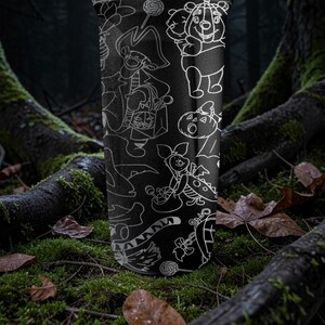 May include: Black tumbler with white line art of cartoon characters in Halloween costumes. The design includes Winnie the Pooh, Piglet, and other characters with candy and pumpkins. The tumbler is set against a forest background with moss and fallen leaves.