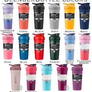 Pode incluir: Uma cole&ccedil;&atilde;o de garrafas de shaker isoladas em a&ccedil;o inoxid&aacute;vel BlenderBottle em v&aacute;rias cores, incluindo lavanda ombre, coral, preto, cinza, manga, marinho, rosa, azul, vermelho, floresta, azul empoeirado, flamingo ombre, sahara sunset, sangria ombre, espuma do mar, framboesa e ameixa.