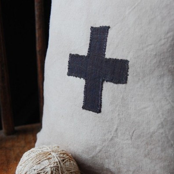 black cross organic pillow