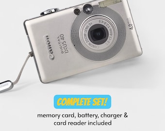 M7853 Canon　IXY DIGITAL 70 PC1193 Canon Digital IXUS 70 7.1MP 3x Zoom Compact Digital Camera