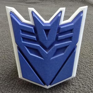 Decepticon Emblem Fan Art – Transformers G1 Inspired 3D Printed | Resin Collectible with Custom Paint -  -Hyper Blue Version