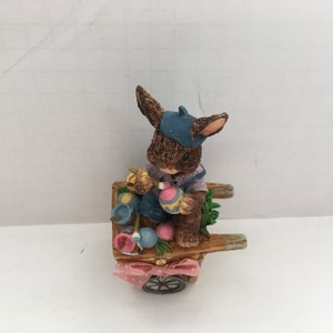 vintage ceramic bunny painting Easter eggs on top of wheelbarrow trinket box spring holiday decor rabbit bunny collectibles special gift box