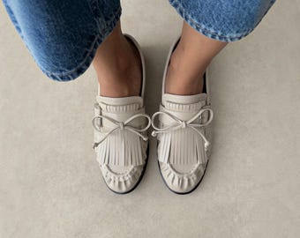Mocasines beige de piel sintética para mujer, bailarinas con flecos y detalle de hebilla, zapatos minimalistas sin cordones, bailarinas cómodas para el trabajo, estilo académico.