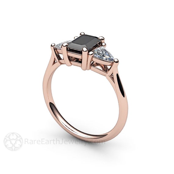 Fascinating emerald cut black diamond ring in 14K Rose Gold.