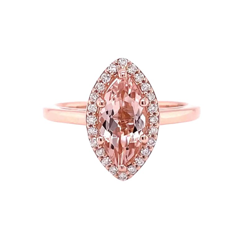 May include: A rose gold ring with a marquise-shaped morganite gemstone surrounded by a halo of small round diamonds.