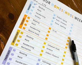 May include: A white paper homeschool weekly planner sheet with colourful headers and checkboxes. The text reads OUR HOMESCHOOL WEEK, WEEK OF 5/4, and lists subjects like Reading, Math, Handwriting, History, and specific student tasks. A black pen rests on the side.