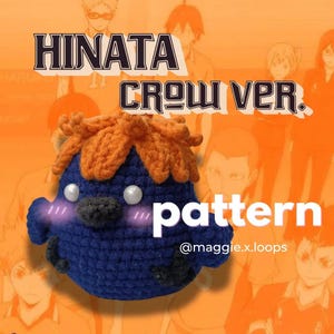 May include: A round, dark blue crocheted plush toy with orange hair, a black beak, and white eyes. The plush features pink blush marks on its cheeks. Text on the image reads HINATA CROW VER. pattern @maggie.x.loops against an orange background.