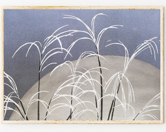 May include: A framed print of a minimalist watercolor painting depicting white grass stalks against a blue and gray background. The painting has a subtle moon shape in the center.