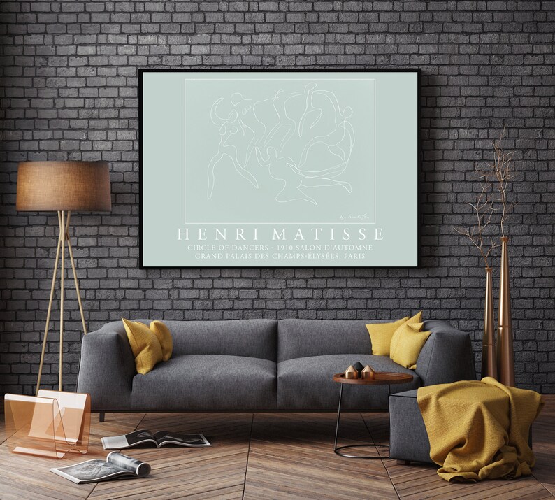 May include: A minimalist line drawing of dancers in a circle, printed on a light blue background. The artwork is framed in black and titled "HENRI MATISSE" with the text "CIRCLE OF DANCERS - 1910 SALON D'AUTOMNE GRAND PALAIS DES CHAMPS-ELYSEES, PARIS" below the image.