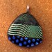 see more listings in the Dichroic Fused Pendants section