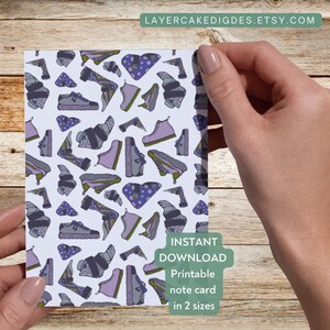 May include: Printable note card featuring a repeating pattern of purple, green, and blue sneakers on a white background. The text "INSTANT DOWNLOAD Printable note card in 2 sizes" is at the bottom of the card.