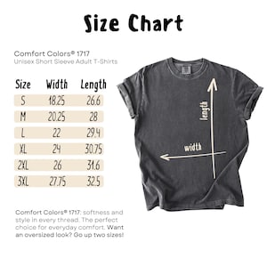 May include: Size chart for unisex short sleeve adult t-shirts. The chart shows the width and length measurements in inches for sizes S, M, L, XL, 2XL, and 3XL. The chart also includes a diagram of a t-shirt with arrows indicating the width and length measurements.