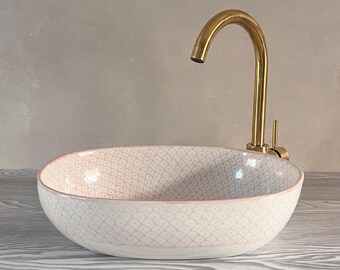 The bathroom is handcrafted from Moroccan pottery with colorful artisanal accessories and is 100% guaranteed.