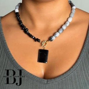 Omkeerbare tweekleurige stenen ketting: zwarte hyperstheen, obsidiaan en howliet tuimelsluiting