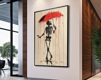 Pode incluir: Uma figura de esqueleto preto e branco segurando um guarda-chuva vermelho, em pé em um ambiente de chuva com respingos de tinta vermelha em um fundo bege.