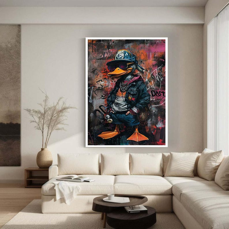 May include: A colorful, abstract painting of a duck wearing a baseball cap and a denim jacket. The duck is standing on a street with graffiti in the background. The text "Dust" is visible in the painting.