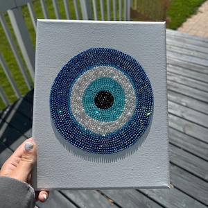 Tela con strass abbagliante e malocchio perfettamente scintillante