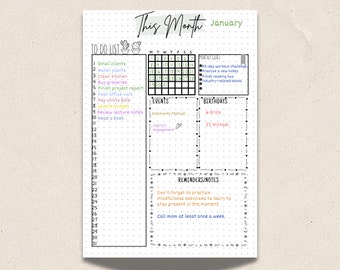 May include: A black and white planner with a dotted grid pattern. The planner has a to-do list, a calendar for January, a section for events, a section for birthdays, and a section for reminders and notes. The planner has a title that says "This Month January".