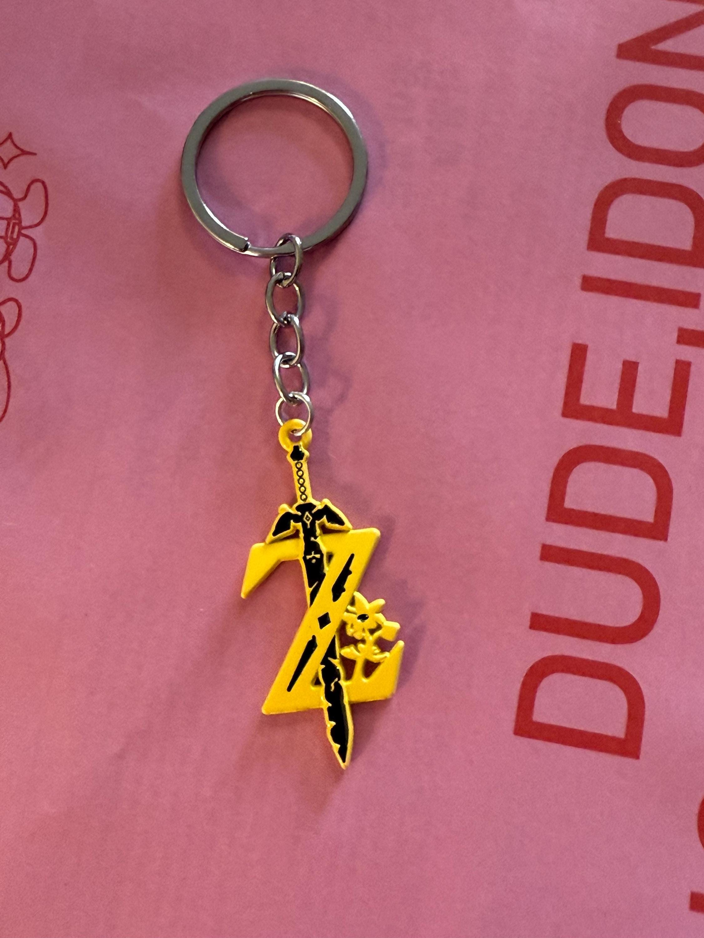 The legend of Zelda heart keychain, heart container, Royal Claymore, Royal Shield