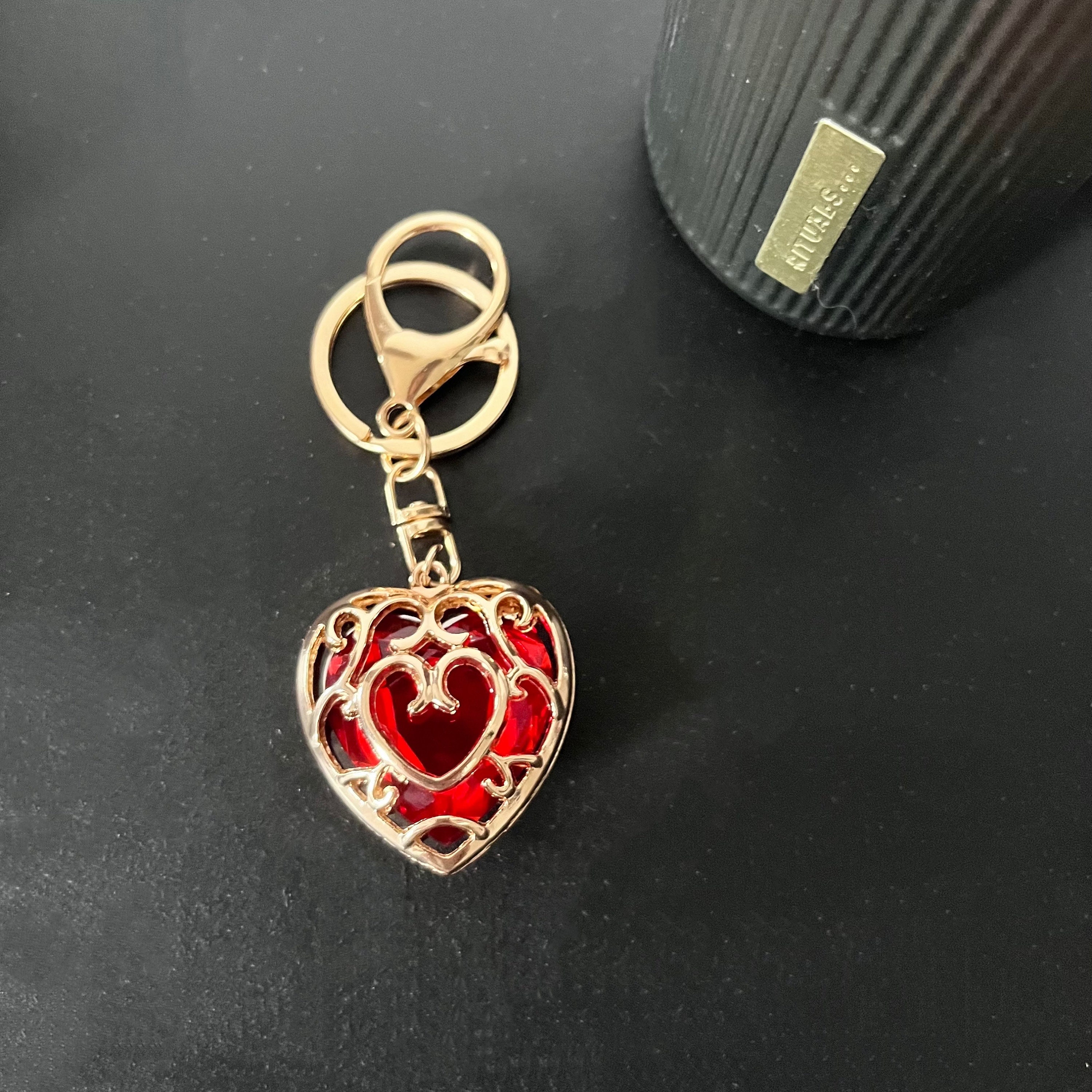 The legend of Zelda heart keychain, heart container, Royal Claymore, Royal Shield