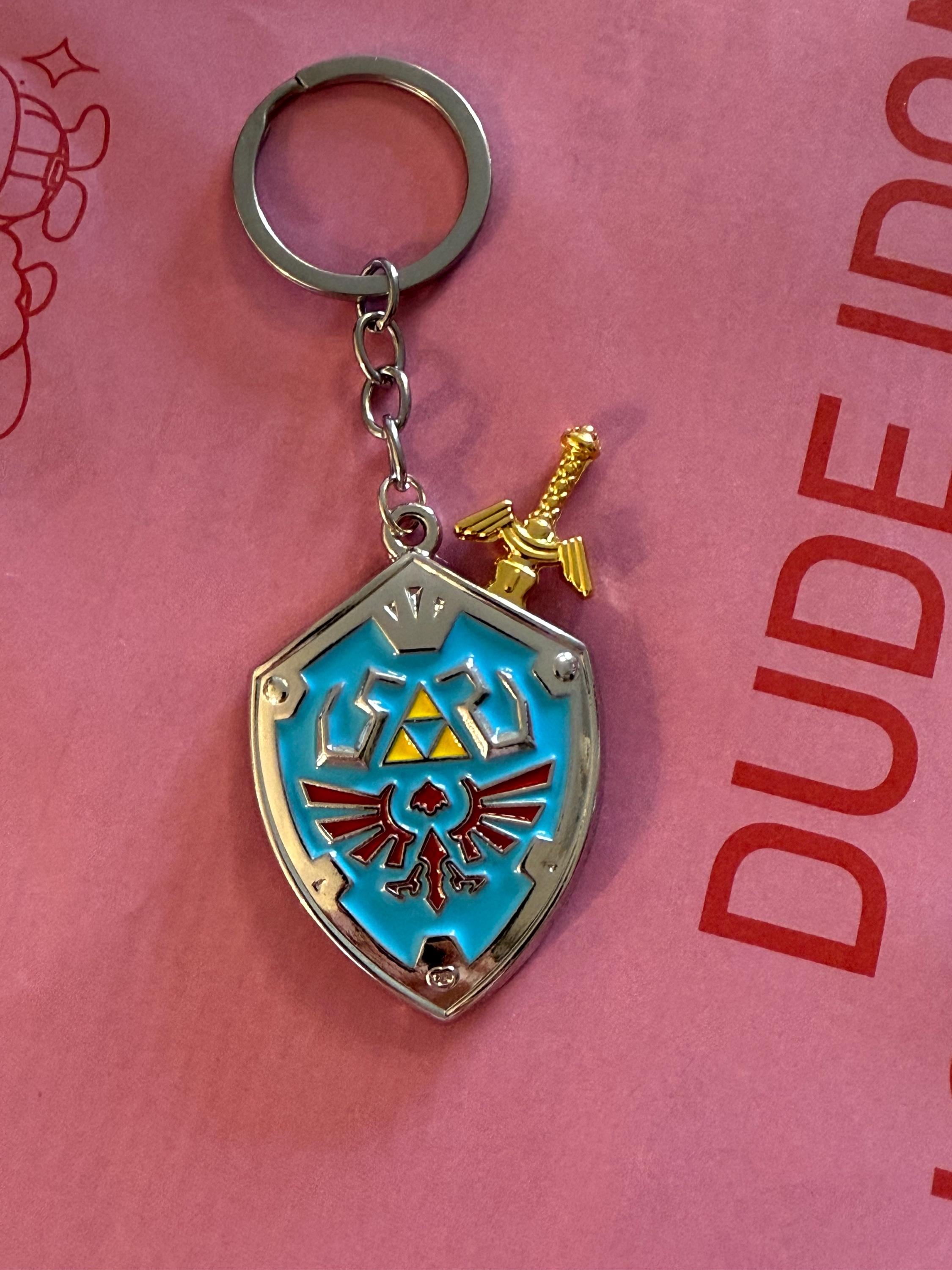 The legend of Zelda heart keychain, heart container, Royal Claymore, Royal Shield