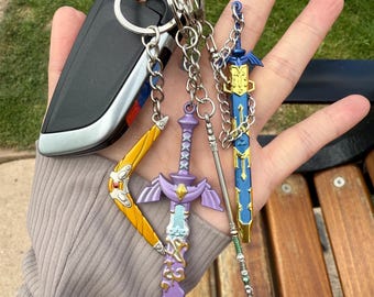 Llavero/Llavero/Tridente de escamas de luz, bumerán de brisa marina, restaurado, espada maestra deteriorada inspirada en la leyenda de Zelda