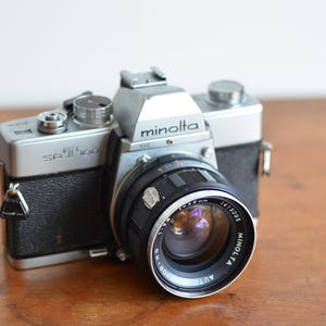 Minolta SRT100 Film Camera & 35mm f/2.8 Rokkor Lens