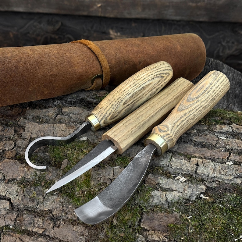 Curved hook knife and carving tools with ash handles, hand-forged set for kuksa carving.