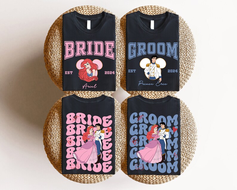 May include: Four black t-shirts with wedding-themed designs. Two shirts say "BRIDE" and "GROOM" with cartoon images of Ariel and Prince Eric. The other two shirts have the words "BRIDE" and "GROOM" repeated in a retro font, with images of the couple.