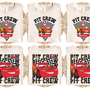 a set of four t - shirts with cars on them