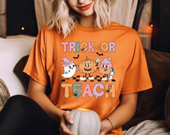 Trick or Teach Shirt, Halloween Teacher T-shirt, Spooky Season Tee, Ghost Teacher Pumpkin Sweatshirt,  School Halloween Party Crewneck