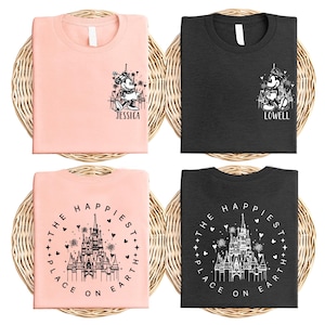 a group of three t - shirts sitting on top of a wicker basket