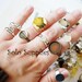 10 Assorted Adjustable Rings - Mixed Colors Styles Shapes Brass Bronze Silver Copper with random bezels, settings, flat pads, etc