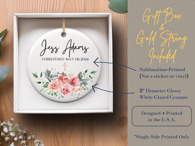 May include: White ceramic ornament with a floral design and the text "Jess Adams Christened May 06, 2024". The ornament is 3 inches in diameter and comes in a gift box with a gold string.