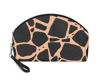 Bolsa de maquillaje con estampado de jirafa: color melocotón y negro