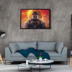 May include: A digital art print featuring a black superhero with a purple and blue costume standing in front of a fiery orange and yellow background. The superhero has a serious expression on their face and is holding their arms crossed in front of them. The background has a large, dark circle in the center.