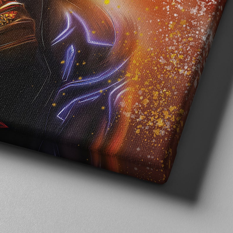 May include: A close-up of a canvas painting with a dark figure in the foreground and a bright orange and yellow background. The background has a splatter effect with gold flecks.