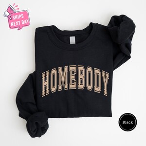 a black sweatshirt with the word homeboy on it