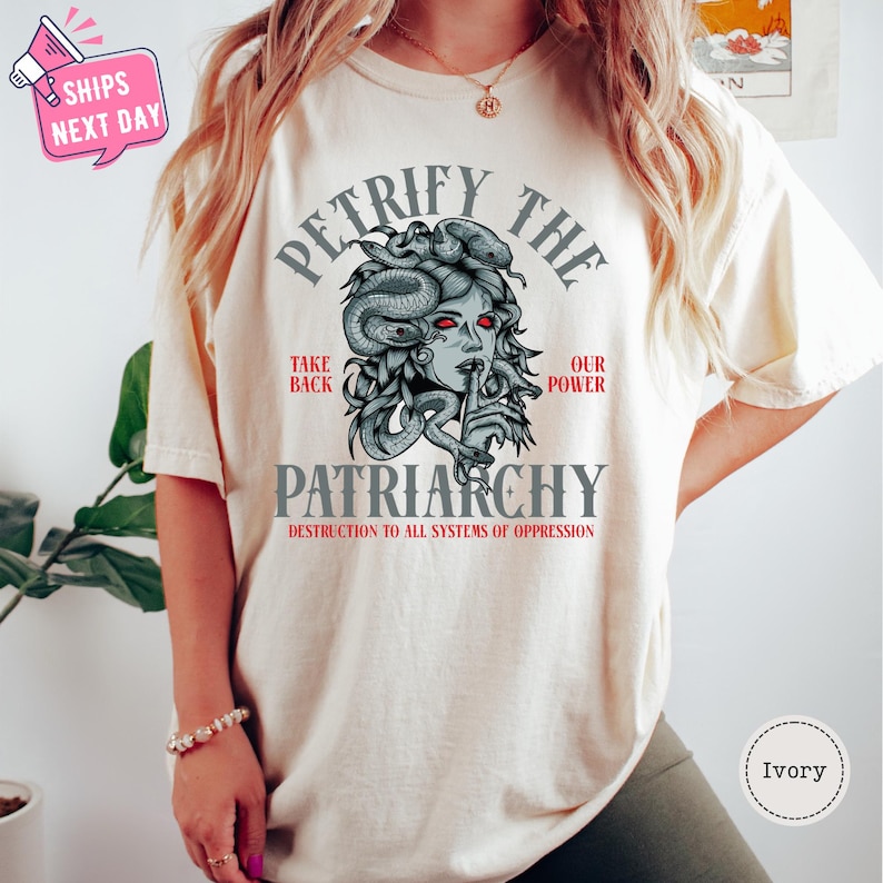 a woman wearing a t - shirt with an octopus on it