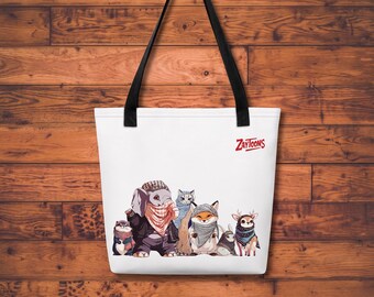 May include: A white tote bag with black shoulder straps featuring a graphic illustration of an elephant, cat, fox, rabbit, and deer wearing patterned scarves and headwear. The red text ZAYTOONS is printed on the upper right side of the bag.