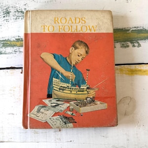 Stary czytnik „Roads to Follow” – książka w twardej oprawie z 1964 r. ze zdjęciami