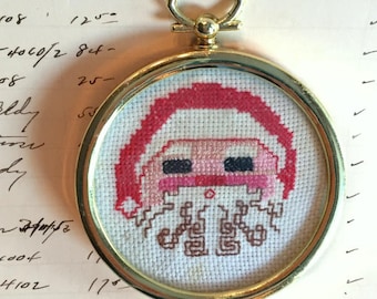 Vintage Cross Stitched Santa Christmas Ornament - Adorable Santa face in gold round frame - Vintage Embroidery, Santa Ornament, Gift Idea