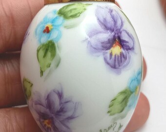 Painted decorative egg ornament. signed